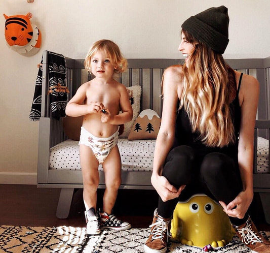 mom and small boy smiling
