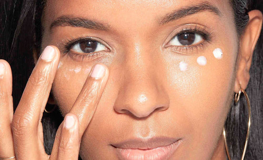 Lizzy Mathis applying Depuff Eye Cream +C