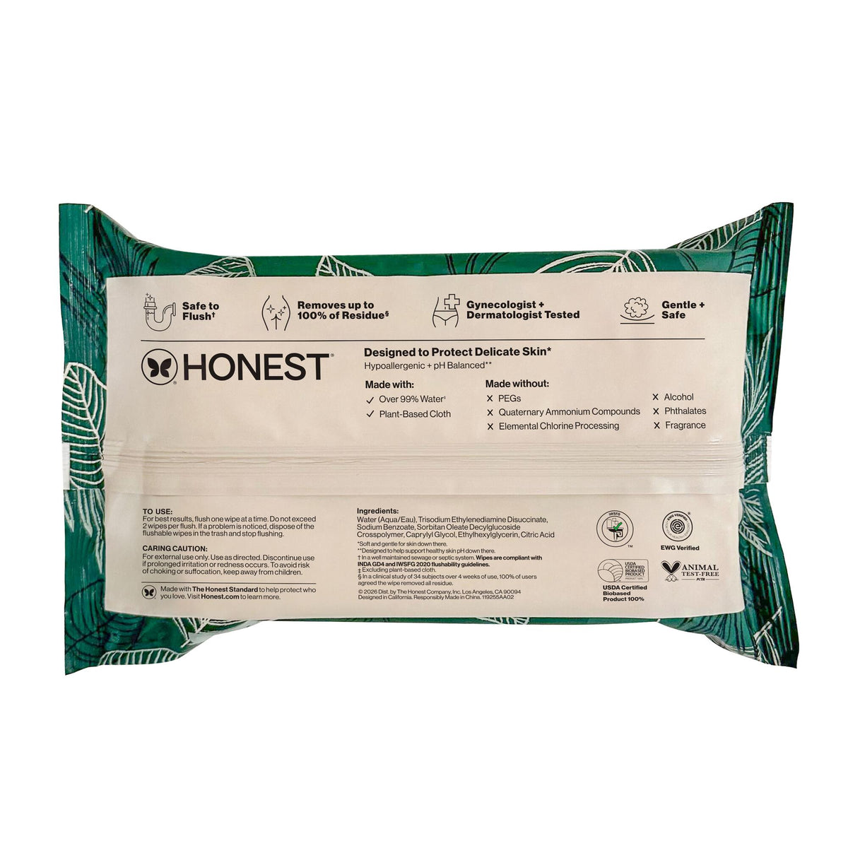 A package of HONEST brand wet wipes on a plain white background. The wipes are in a resealable bag with a cream-colored front label and a green tropical leaf pattern on the sides.