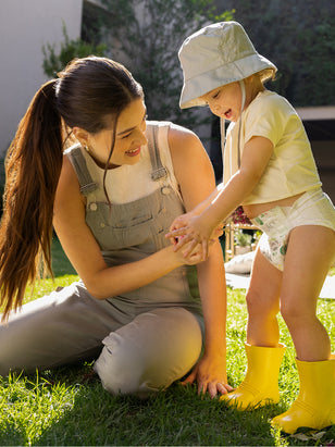 Baby with Diapers and Clean Conscious Wipes