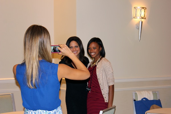 Jessica Takes a Photo of Soledad O'Brien and a Student